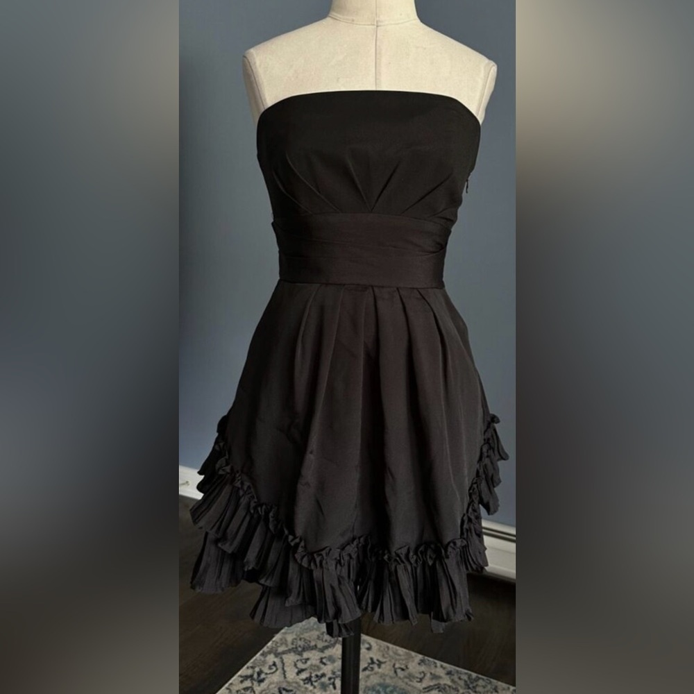 **New w/Tags** 

BCBGeneration Black Strapless Pleated Ruffled
Mini Dress
